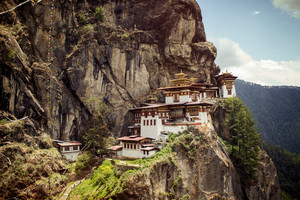 In Bhutan's Paro Valley, the stunning Tigers Nest Monastery perches on a mountain cliff.
